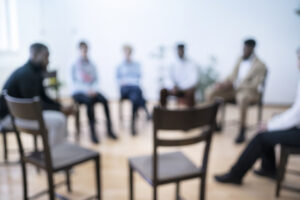 Meeting of a Men's Group Therapy Session - defocused